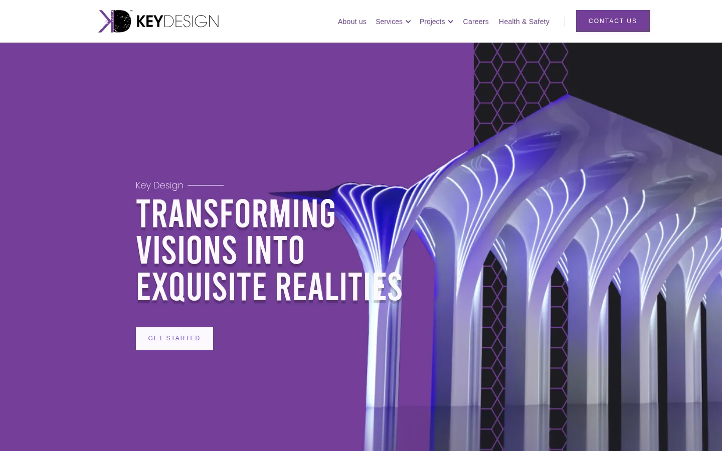 Key Design hero: Transforming visions into exquisite realities, next to a white arched structure lit in purple